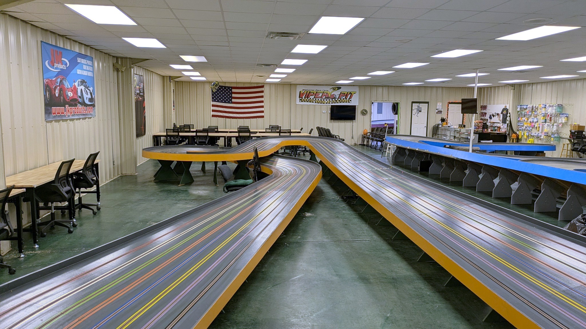 Orange Track and spacious main room inside Viper Pit Raceway